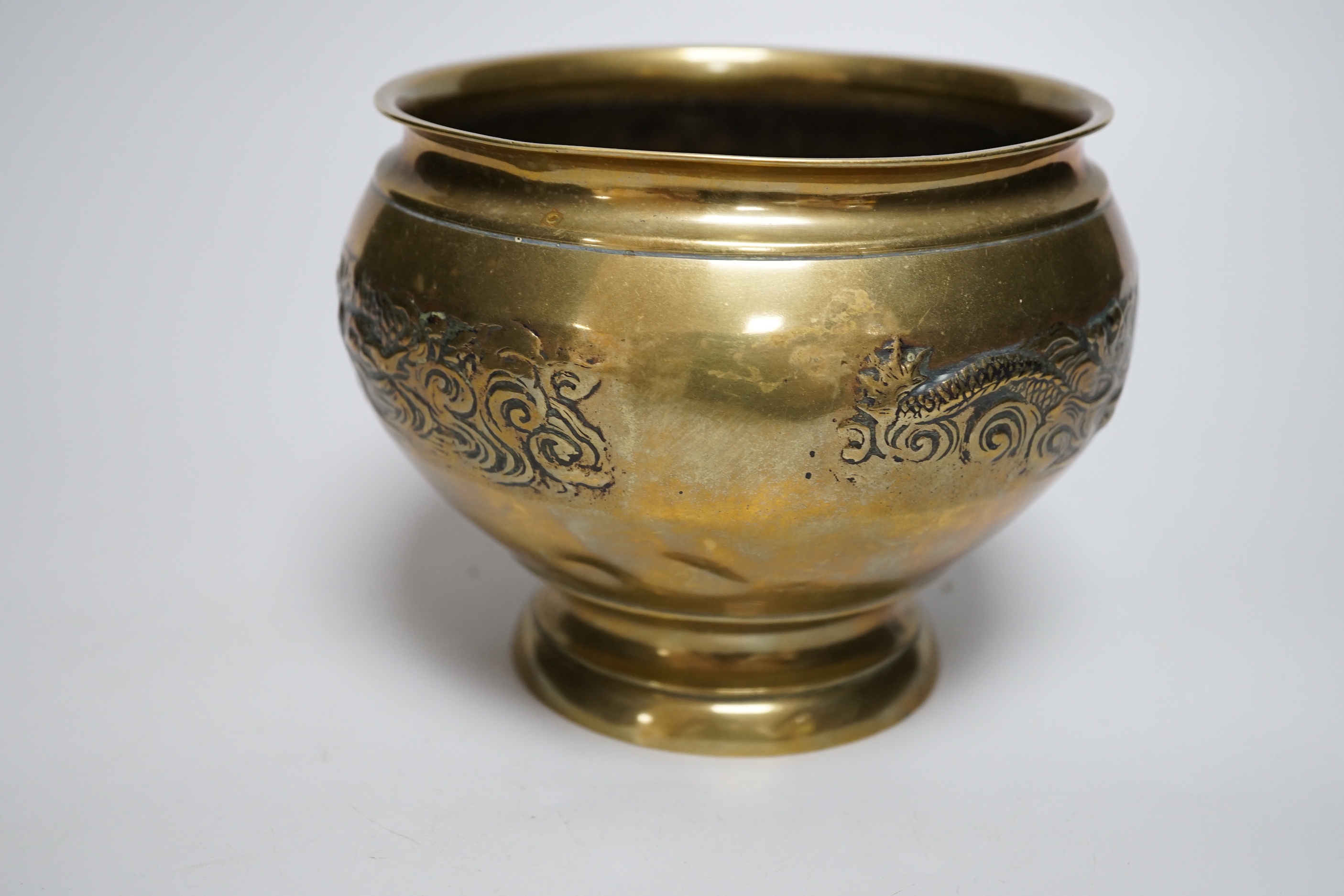 A Chinese brass bowl, 13cms high